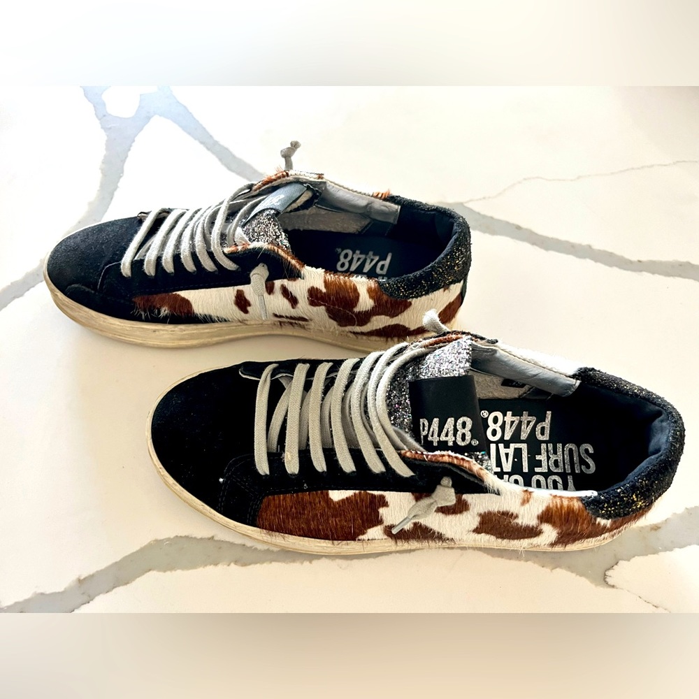 P448 tennis shoes. Size 38 (7.5). They are in great condition with some scuffs.